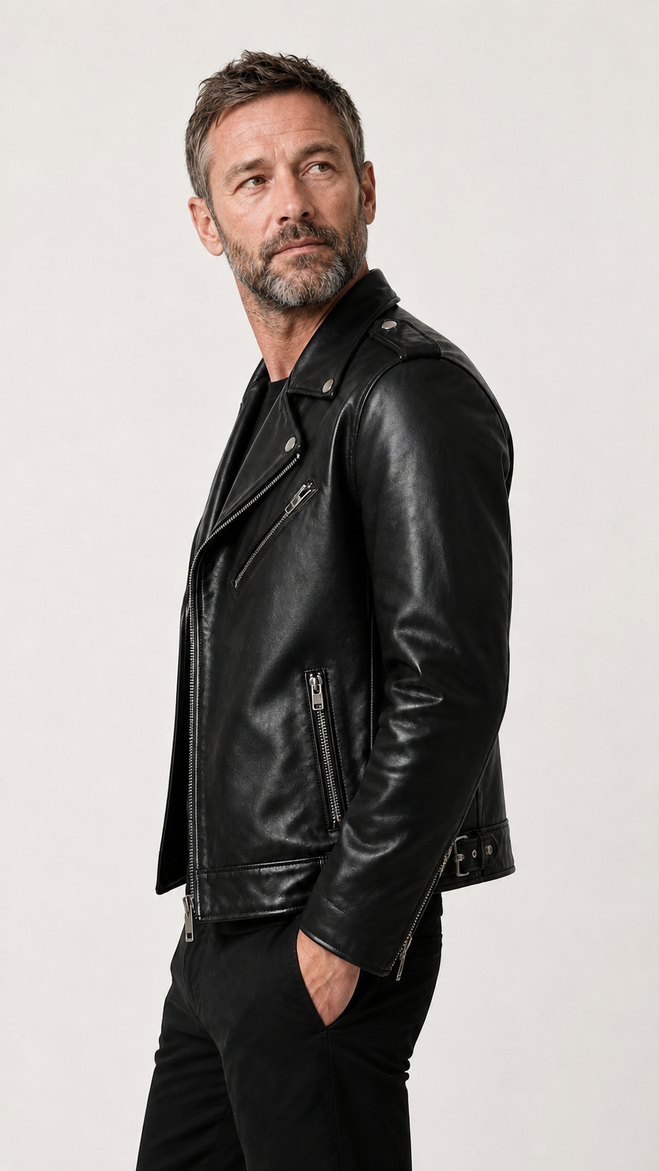 Side view of a man in the black perfecto leather jacket — British model